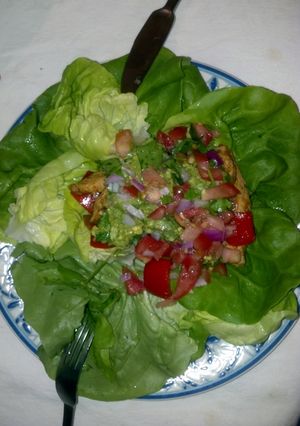 A picture of Paleo Chicken Fajitas with Guacamole.
