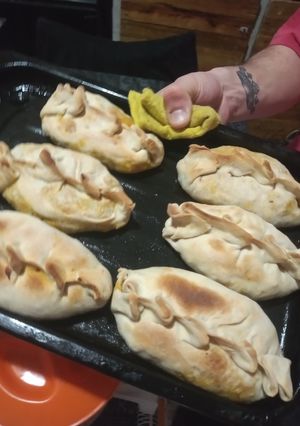 Una foto de Canastitas de zapallitos cerradas y masa
