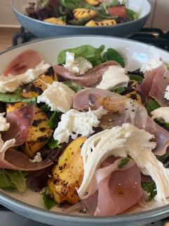 A picture of Salad of chargrilled peach, prosciutto and mozzarella.