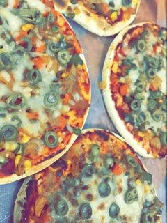 صورة لوصفة بيتزا بالذره 😋✨