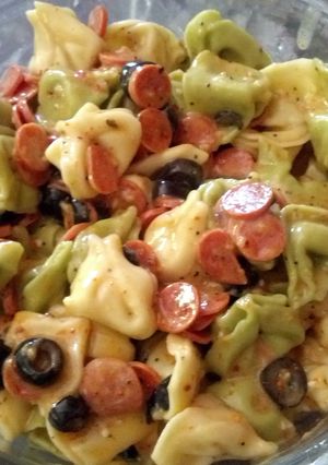 A picture of mixed cheese tortillini pasta salad.