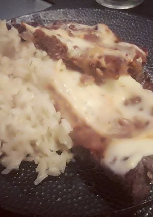 Una foto de Carne picada a la pizza con arroz frito