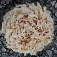 A picture of Home Made Fettuccine Alfredo Pasta.