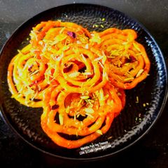 A picture of Kesari Shahi Jalebi - Indian Traditional Sweets.