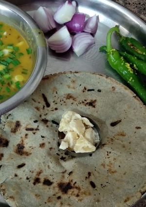 A picture of Bajara ki roti with moong dal.