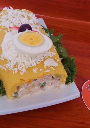 A picture of Causa Rellena with Tuna Chunks.