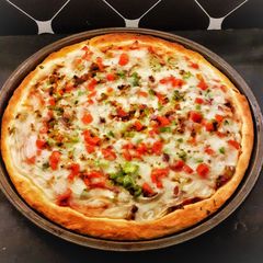 A picture of Low Budget Pizza 🍕.