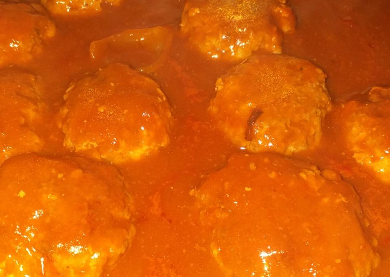 Tortitas en salsa roja