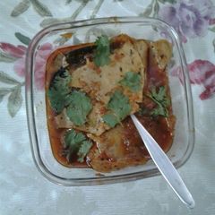 A picture of Masala papad curry.