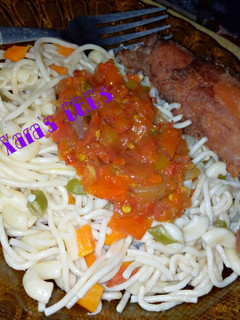 A picture of Spagh macaroni With Tomato Sauce.