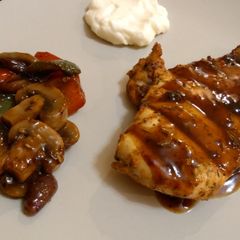 Grilled chicken breasts with barbeque sauce A picture of Grilled chicken breasts with barbeque sauce.