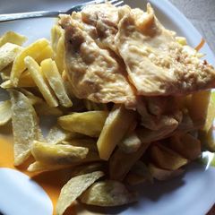 A picture of Fried potatoes n egg.