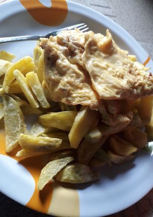 A picture of Fried potatoes n egg.