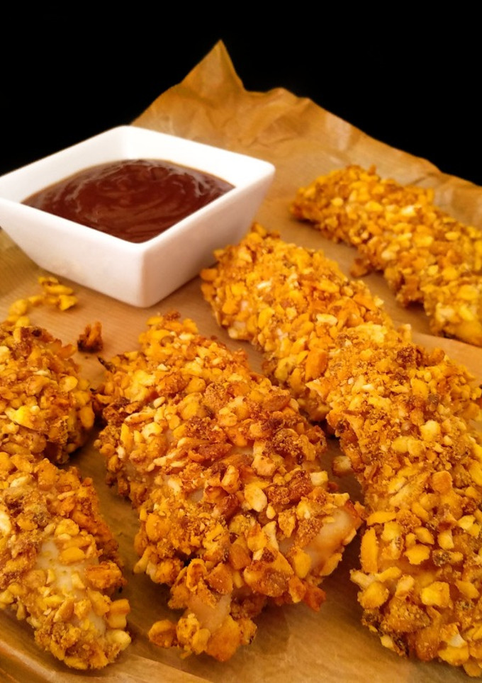 Una foto de Solomillos de pollo con kikos {al horno}