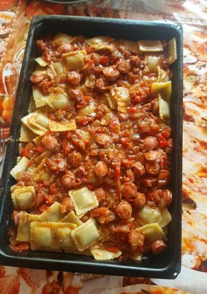 Una foto de Ravioles con salsa