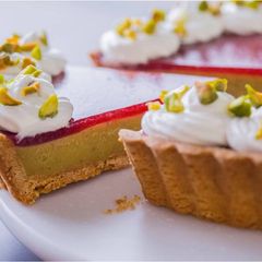 A picture of Strawberry & Pistachio Custard Tart.