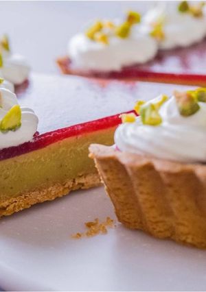 A picture of Strawberry & Pistachio Custard Tart.