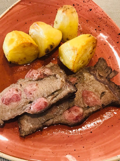 Una foto de Punta de picana mechada con tocino