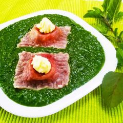 A picture of Ravioli in Pesto Sauce.