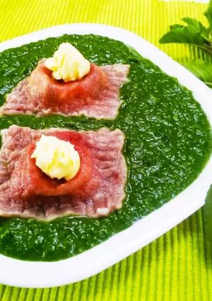 A picture of Ravioli in Pesto Sauce.