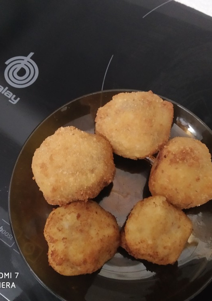 Una foto de Croquetas de bacon y dátiles