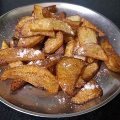 A picture of Fried potato veg.