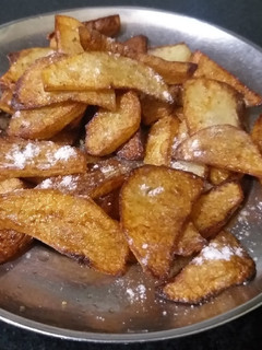 A picture of Fried potato veg.