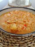 Arroz caldoso con sepia, almejas y gambones