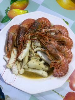 Una foto de Tiras de pota y gambas