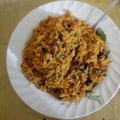 A picture of Jollof Rice with Egwu.