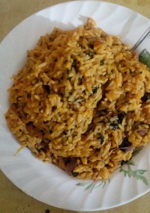 A picture of Jollof Rice with Egwu.