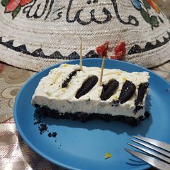 A picture of Cream, creamed cheeses and honey dessert.