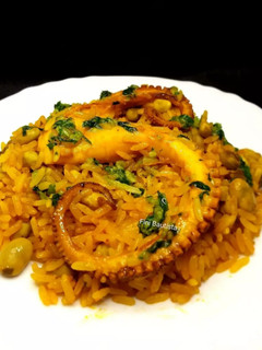 Una foto de Arroz con habas y pulpo