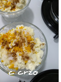 Una foto de Calostros con canela y ralladura de naranja