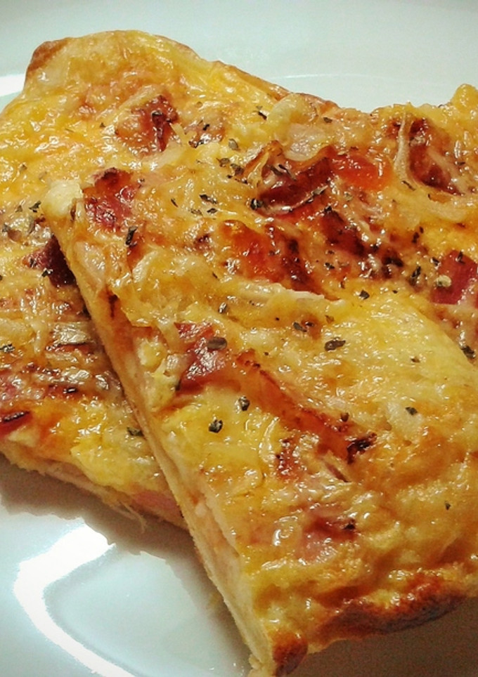 Una foto de Pizza carbonara