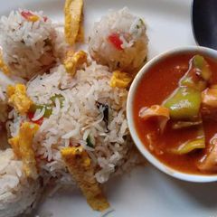 A picture of Fried rice with Manchurian.