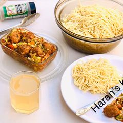 A picture of Spaghetti with veggies meatballs soup.