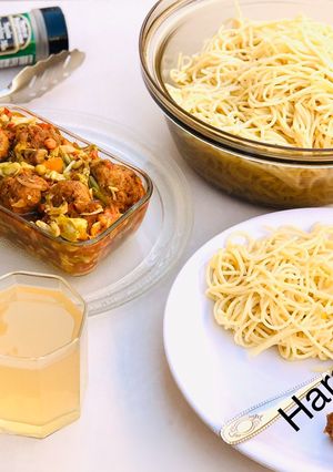 A picture of Spaghetti with veggies meatballs soup.