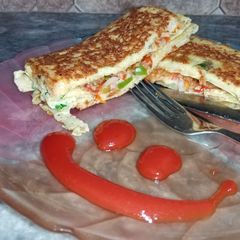 A picture of Stuffed pizza egg sandwich.