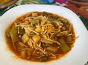Una foto di pasta con le taccole