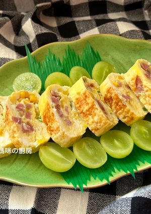 A picture of Corn and Sausage Tamagoyaki.