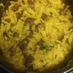 A picture of Cheesy jalepeno mac and cheese with deer sausage.