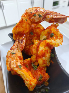 A picture of Grilled tiger prawns.