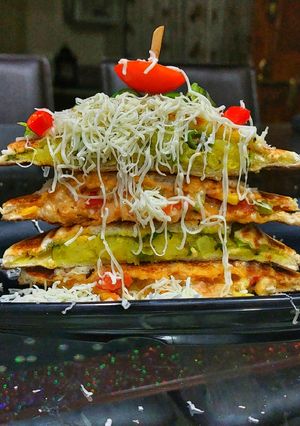 A picture of Veg mayo masala club sandwich.
