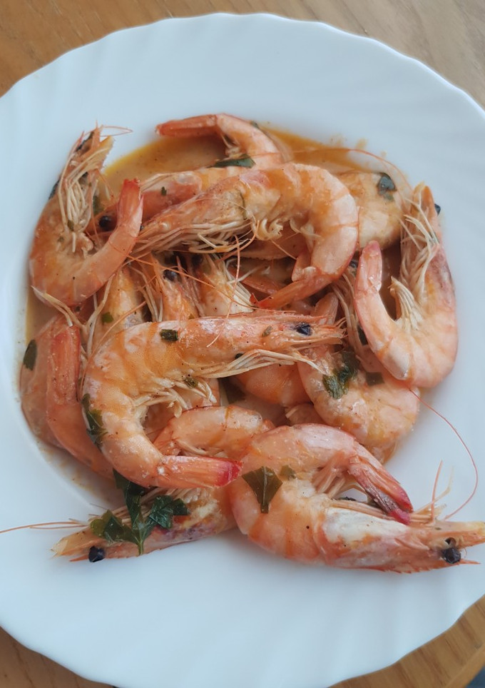 Una foto de Langostinos en salsita