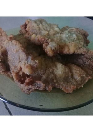 Una foto de Milanesa de carne condimentada distinta