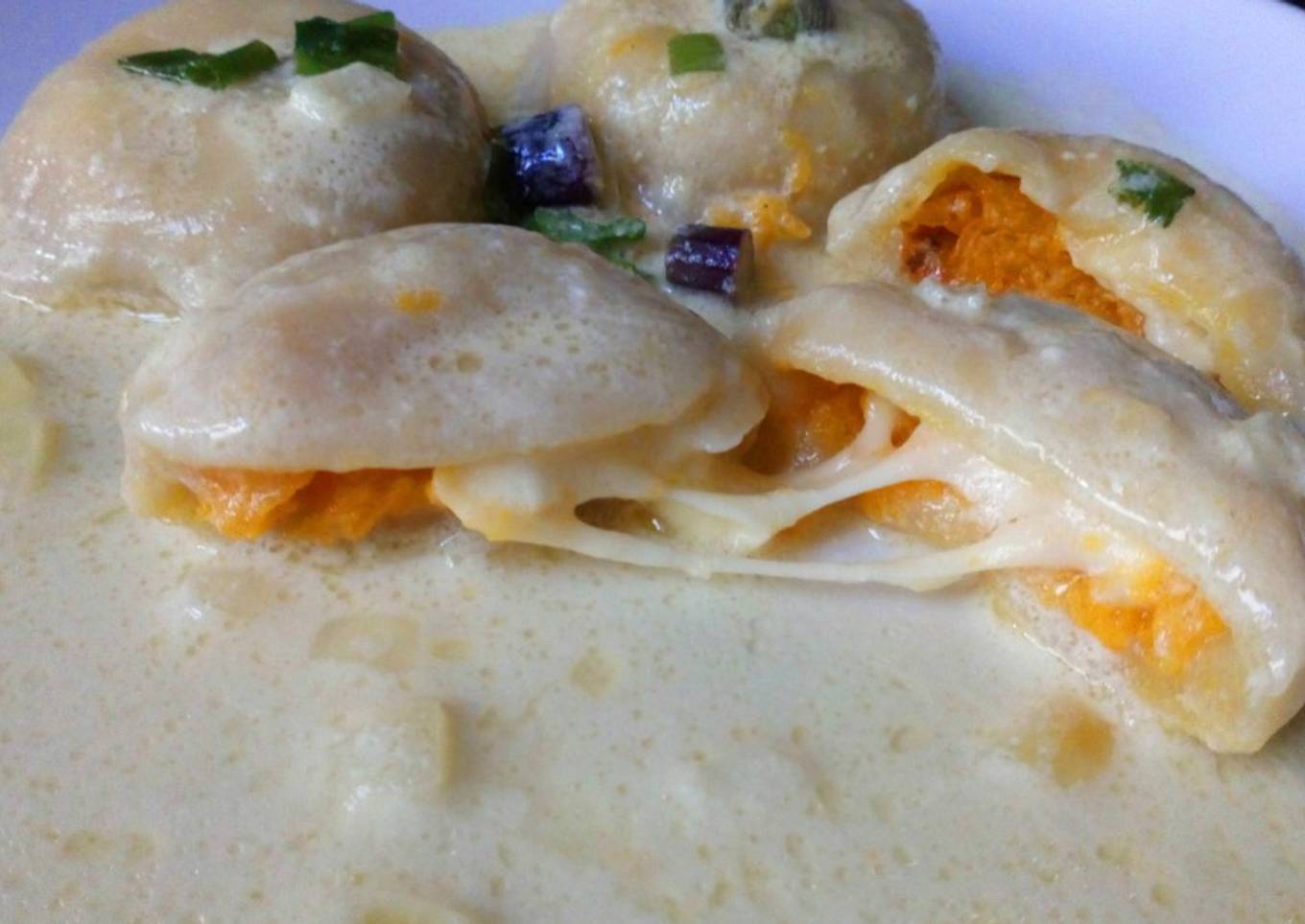 Sorrentinos de calabaza asada con crema al verdeo