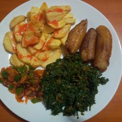A picture of Deep fried ripe bananas, chips & veges.