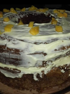 Una foto de Torta 1, 2, 3, 4 con chocolate, crema & durazno 🍑🍫