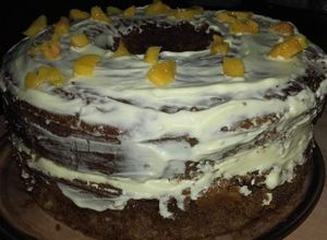 Una foto de Torta 1, 2, 3, 4 con chocolate, crema & durazno 🍑🍫